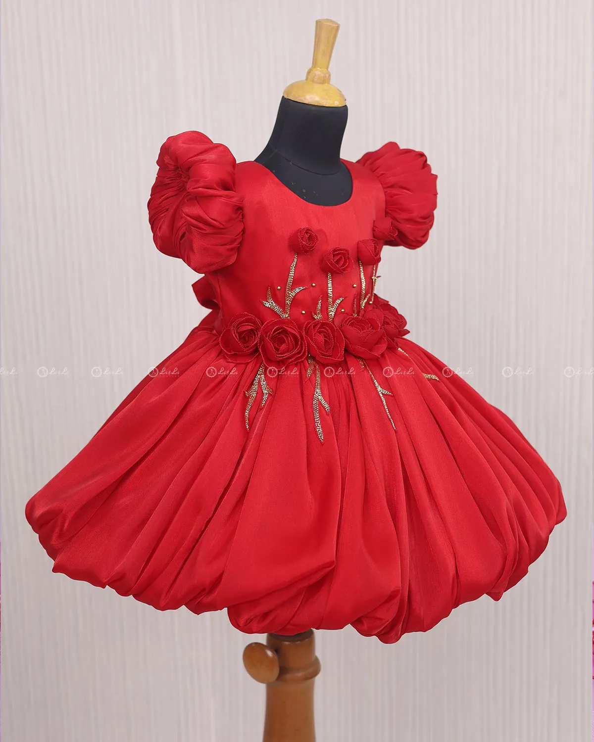 Red Balloon Gown with Handcrafted Rose Embellishment.