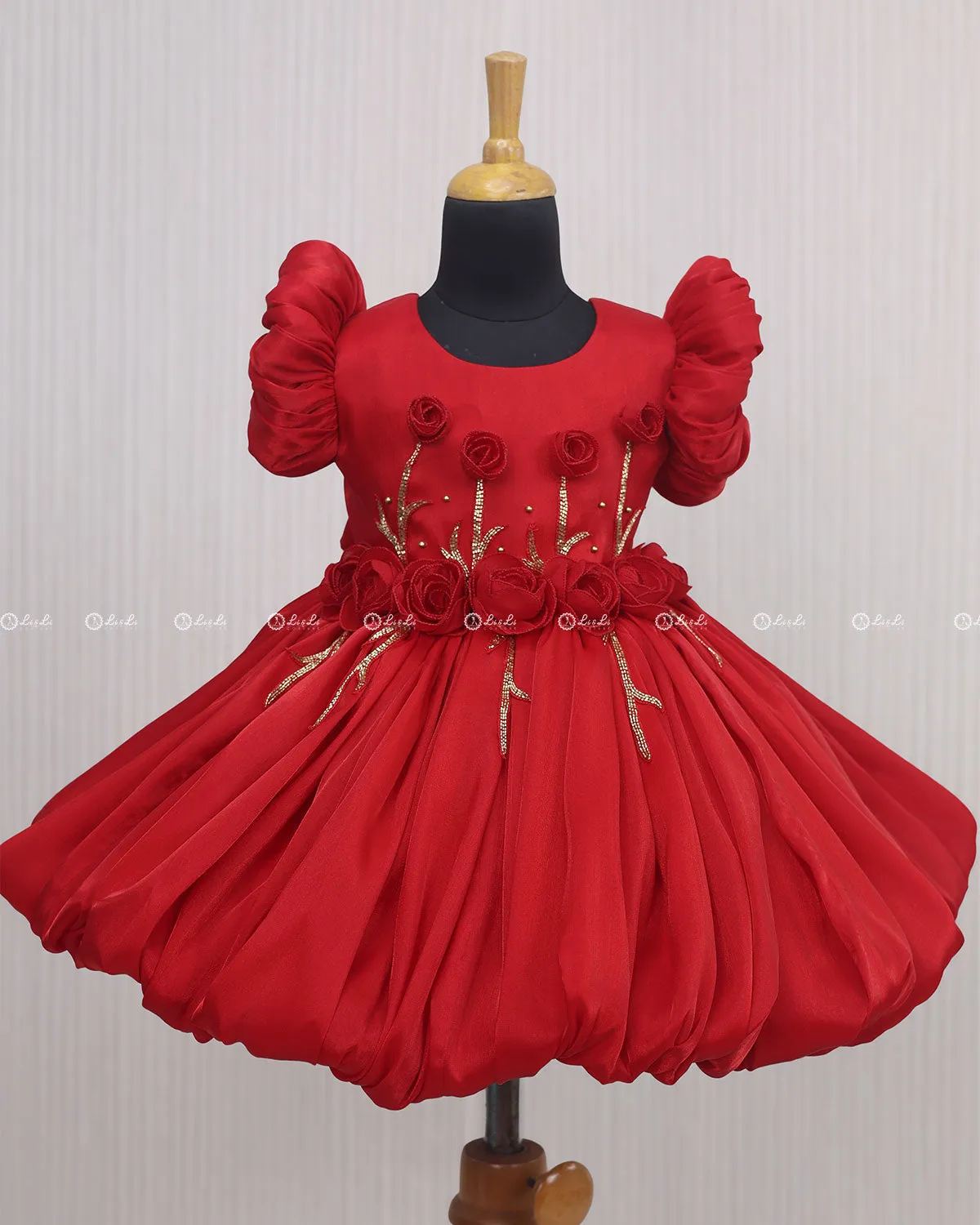 Red Balloon Gown with Handcrafted Rose Embellishment.