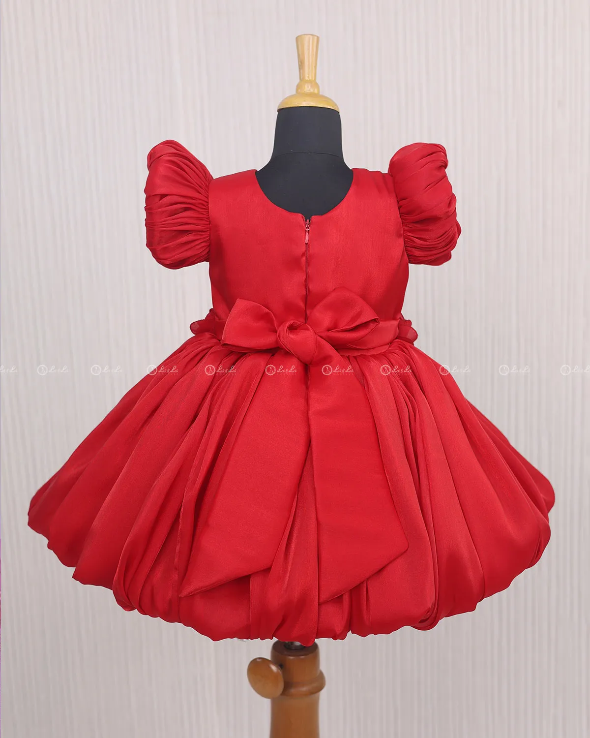 Red Balloon Gown with Handcrafted Rose Embellishment.