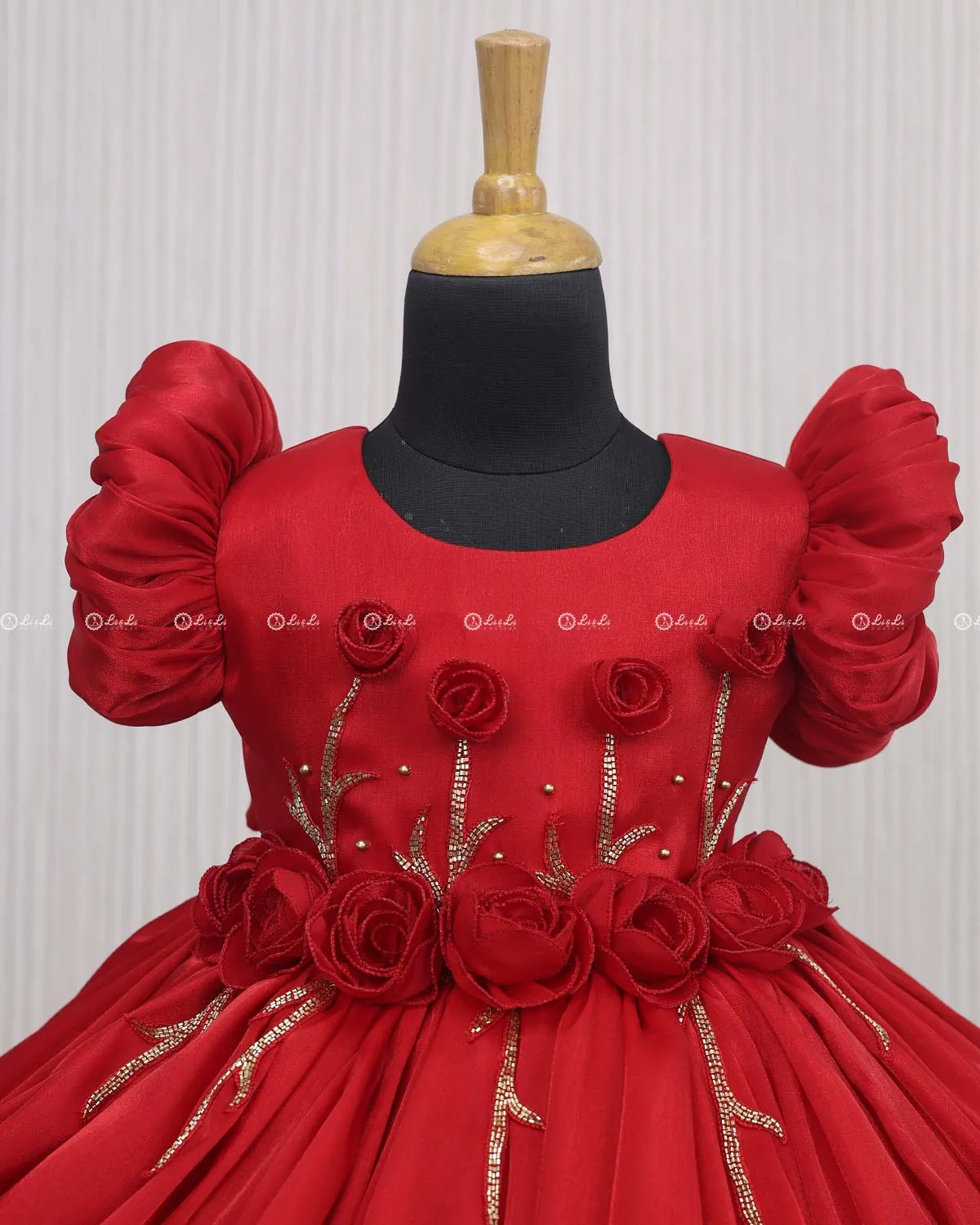 Red Balloon Gown with Handcrafted Rose Embellishment.