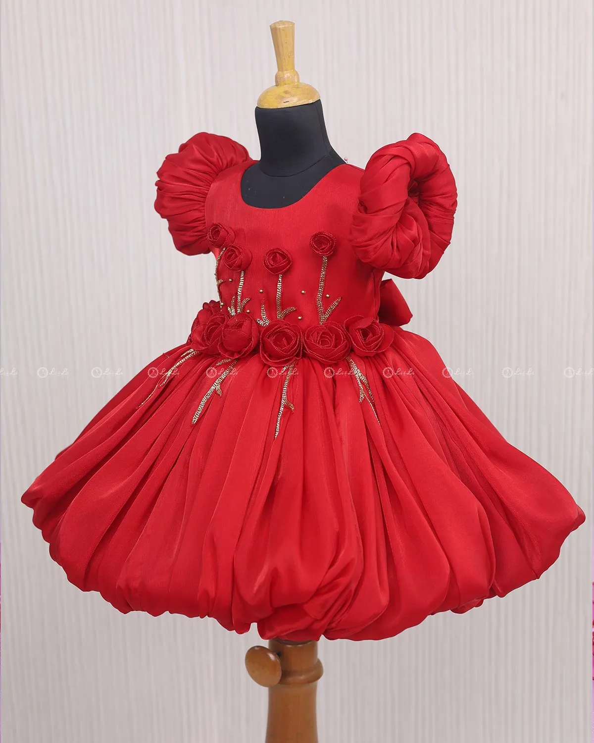 Red Balloon Gown with Handcrafted Rose Embellishment.