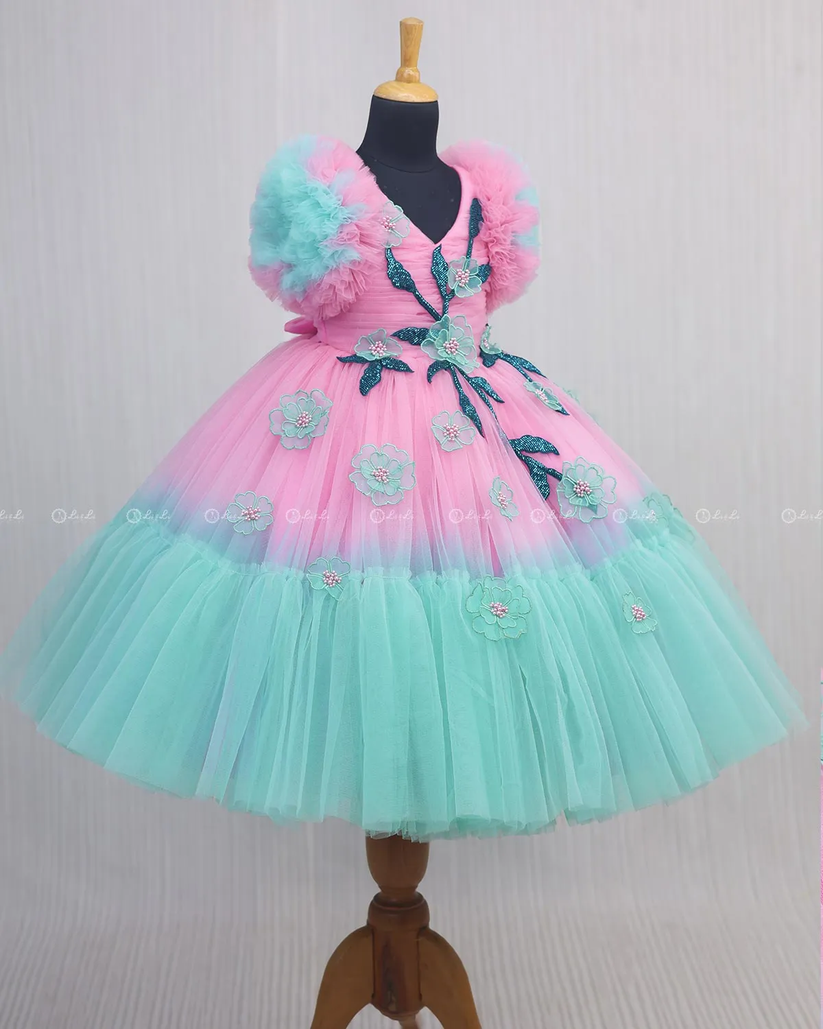 Turquoise and Pink Double Shaded Gown with Handicrafted Flowers and Leaves