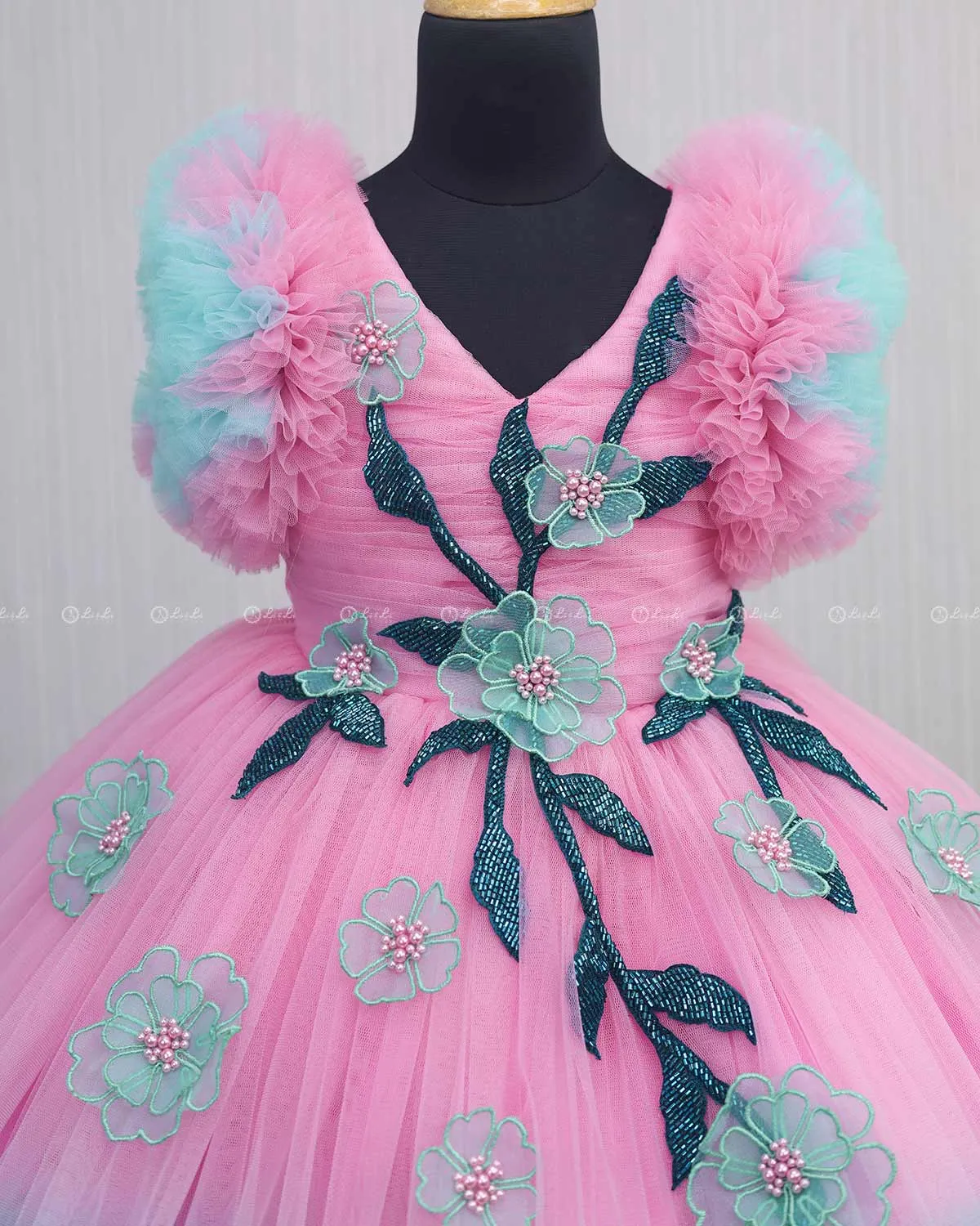 Turquoise and Pink Double Shaded Gown with Handicrafted Flowers and Leaves